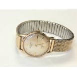 A gent's 9ct gold Rotary wristwatch on plated expanding bracelet