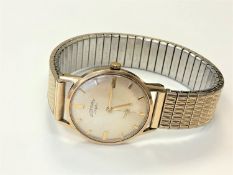 A gent's 9ct gold Rotary wristwatch on plated expanding bracelet