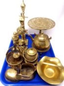 A tray containing assorted brass ware including trivets, teapots, hand bell, ornaments etc.