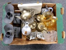 A box containing assorted metal ware including a pair of Chinese style candlesticks,
