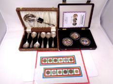 A Westminster Queen Elizabeth II three piece proof coin set with gold plating in case together with