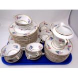 A 39 piece Limoges floral patterned, gilt rimmed tea service.