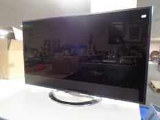 A Sony KDL-46W905A LCD TV with remote.