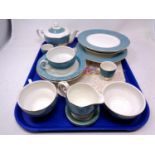 A tray containing part antique Wedgwood tea and dinner service together with a further cake plate.