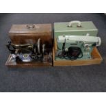 A Whiteley universal vintage hand sewing machine in case together with a further Pinnock electric