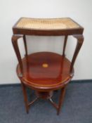 An Edwardian inlaid mahogany circular two tier occasional table together with a rattan stool