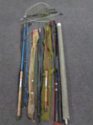 A quantity of assorted fishing rods to include Kingfisher match rod, Norman two piece rods,