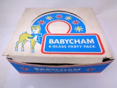 A set of six Babycham glasses in original box.