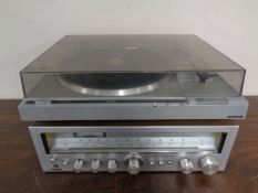 A Hitachi DD automatic turntable model HT-66S together with a Samuel stereo receiver JCX 2150.