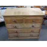 A 19th century pine hay bin the form of a chest.