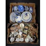 Two boxes containing miscellanea including blue and white ceramics, Ringtons caddy beer steins,