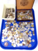 A tray containing cigar box and tub containing a large quantity of foreign coinage, British crowns,