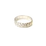 A 9ct white gold textured band ring, size N CONDITION REPORT: 2.