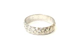 A 9ct white gold textured band ring, size N CONDITION REPORT: 2.