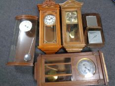 Four wall clocks including Hermle,