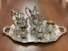 A heavy quality five piece plated tea service with tray by Wallace 'Baroque' pattern.