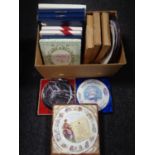 A box containing assorted collector's plates and wall plaques including Wedgwood, Royal Doulton etc.