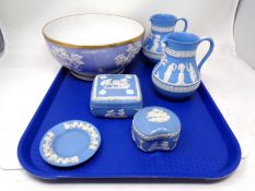 A tray containing five pieces of Wedgwood blue and white Jasperware together with a further