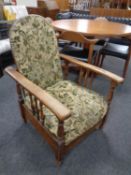 A 20th century oak framed adjustable armchair.