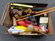A box containing vintage games including a croquet set, dominoes, playing cards etc.