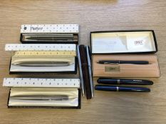 Three vintage fountain pens by Waterman, Swan and another maker,
