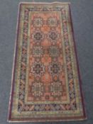 A Caucasian rug 177cm by 87cm