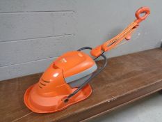 A Flymo Mow-N-Vac with lead