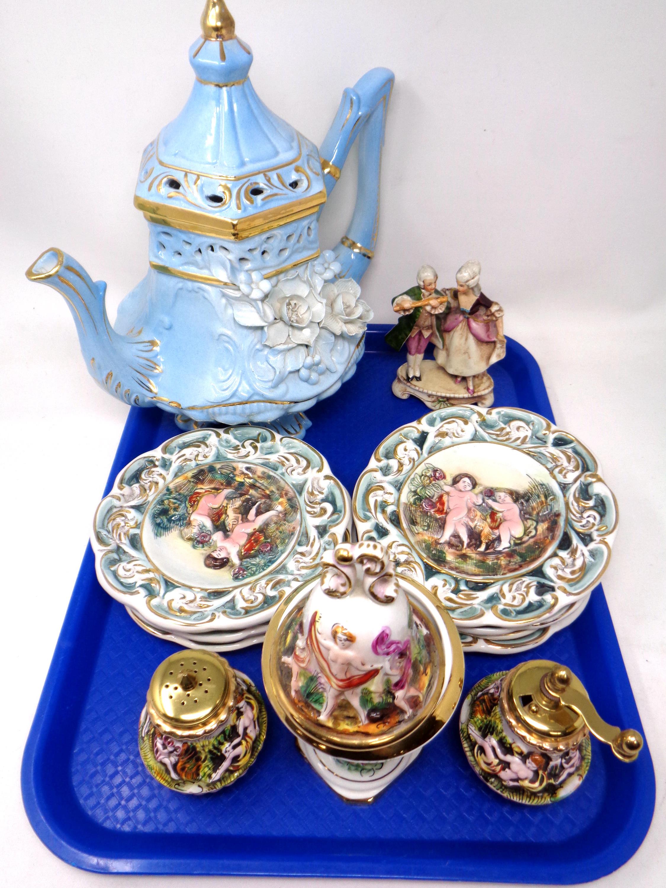 A tray containing assorted Italian ceramics including flower encrusted teapot,