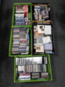 Five crates containing assorted DVDs and CDs.
