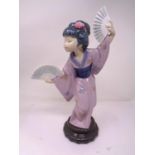 A Lladro figure - Geisha with hand fans.