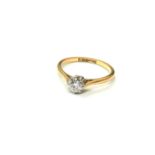 An 18ct gold and platinum diamond solitaire ring, size J CONDITION REPORT: 1.