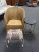A painted Lloyd Loom basket chair together with two 20th century stools on metal legs.