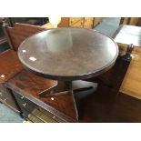 A 20th century circular Bakelite pedestal occasional table