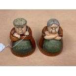 A pair of Royal Doulton Suffragette salt and pepper pots 'Votes for Women & Toil for Men',