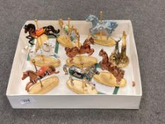A Franklin Mint Carousel horse collection, together with a pocket watch display stand.