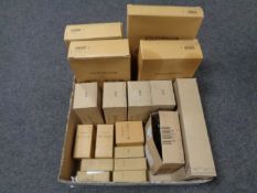 A box containing Volkswagen group car parts including, air filters, oil filters, injectors etc.