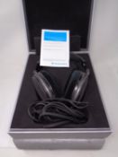 A set of Sennheiser HD650 headphones (boxed).