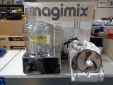 A Magimix system 5100 automatic food mixer with accessories,