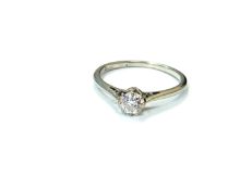 A platinum diamond solitaire ring, size J CONDITION REPORT: 1.
