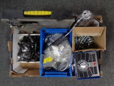 A box containing a commercial air purifier, organiser box, nuts and bolts, paint roller etc.