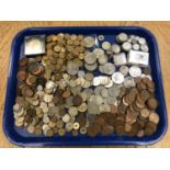A tray of mainly British coins including George V silver florins and shillings,