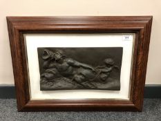 Classical Contemporary School : Mythological Scene with Man Blowing Horn and Cherub, relief plaque,