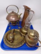 A tray containing antique and later brass and copper wares including an Art Nouveau spirit kettle