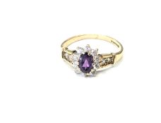 A 9ct gold amethyst dress ring (misshapen) CONDITION REPORT: 2.