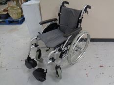 An Orbit Roma medical folding wheelchair