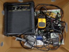 A box containing a G-10 guitar amplifier,