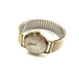 A gent's 9ct gold Lanco manual-wind wristwatch, on gilt expanding strap,