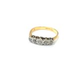 An 18ct gold and platinum five-stone diamond ring, size K CONDITION REPORT: 2.