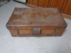 An antique leather luggage case.