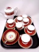 A tray containing a 16 piece Royal Stafford bone china tea service together with a further Aynsley